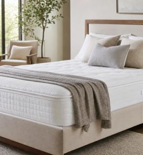 mattress for sale displayed in a modern bedroom showroom